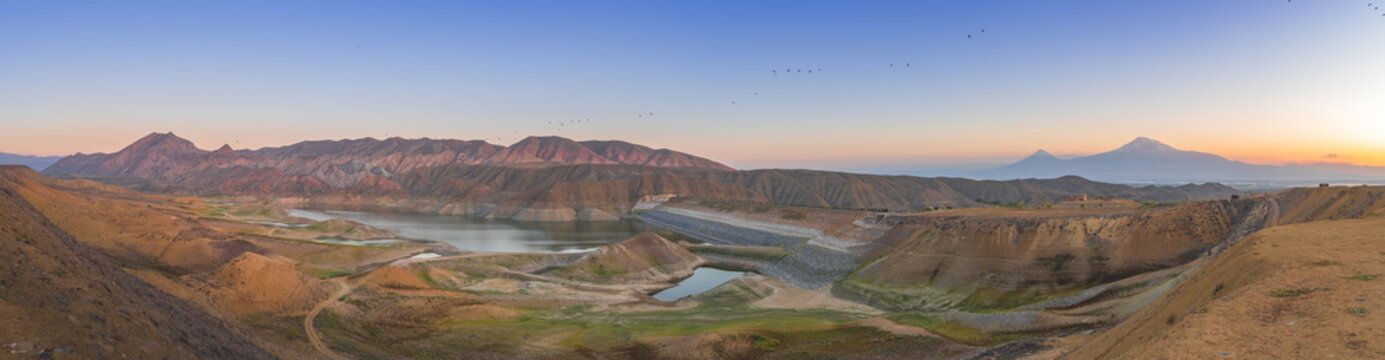 Wide angle sunset view of Azat lake in Armenia with Little Ararat (Armenian: Փոքր Արարատ; Turkish: K&uuml;&ccedil;&uuml;k Ağrı) and Mount Ararat (Armenian: Արարատ; Turkish: Ağrı Dağı) in background.