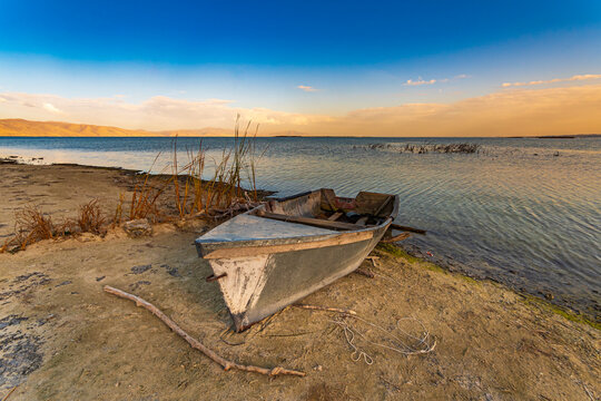 Old boat on the beach of the Sevan lake, Armenia
