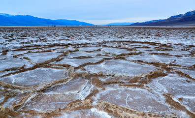 Death Valley National Park, Salt with clay, California. Smooth salt valley with cracked and swollen salt, dead salt landscape
