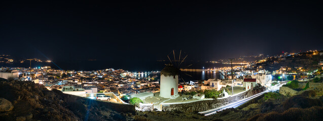 Fototapeta premium Night time panorama of Mykonos city, Cyclades, Greece