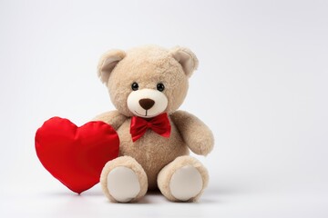 Obraz premium cute teddy bear with a red heart, a symbol of love. Traditional gift for Valentine's Day on February 14
