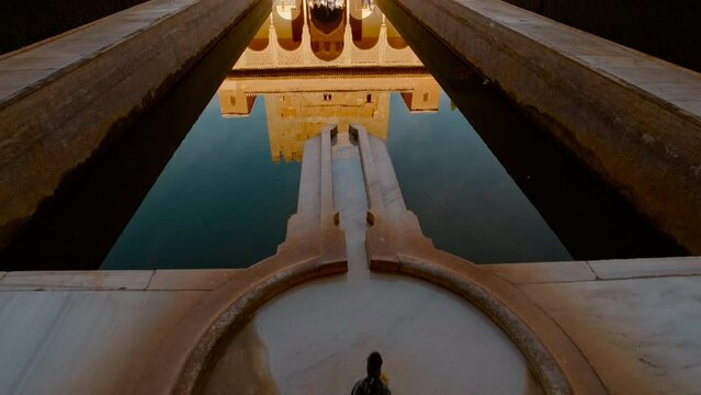 The Alhambra Palace - The Court of the Myrtles, also known as Patio de los Arrayanes, in Comares Nasrid Palace, Granada Anadalucia, Spain