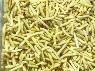Fries French Frozen , vegetable for food frozen, lying in the refrigerator in supermarket. concept ingredient fast food