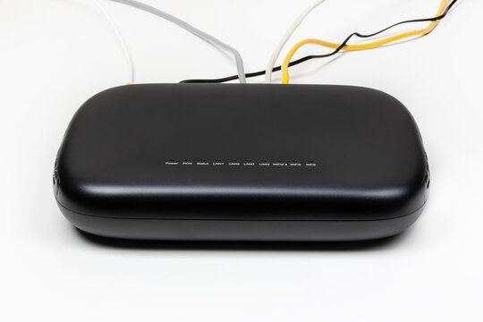 black gpon subscriber terminal with connection to a fiber optic Internet network and various devices with lan cables on a white background