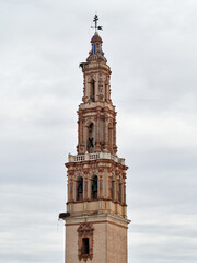 Fototapeta na wymiar Towers of Church of Ecija, town of Seville, Andalusia, Spain. Known for the city of towers for its churches.