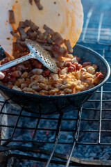 Cooking the typical Spanish dish of 