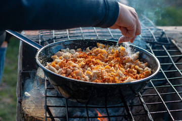 Cooking the typical Spanish dish of 