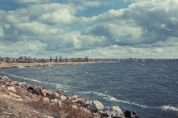 River bank in windy weather with waves
