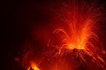 Eruptive vent with lava emis at the top of the Etna volcano
