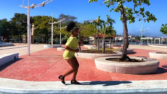 Slow motion shot of beautiful cuban woman dancing
