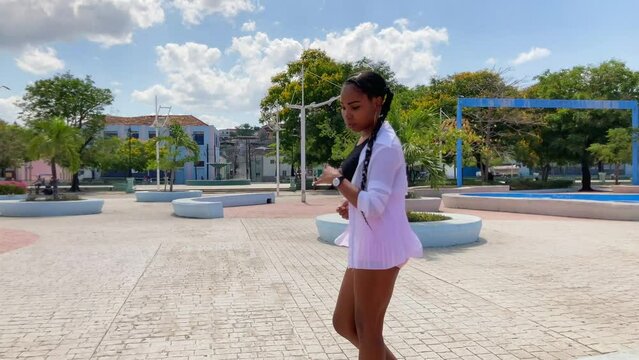 Cuban dancers rehearses in a park in Santiago de Cuba