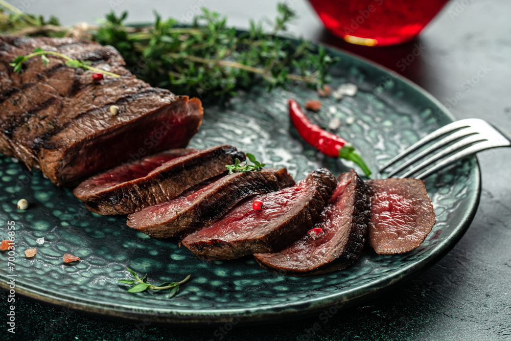 Wall mural sliced beef steak medium rare. restaurant menu, dieting, cookbook recipe top view