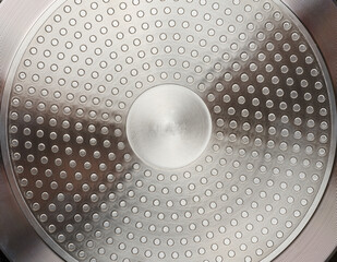 The bottom of a metal frying pan