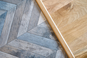 Detail Shot of two different types of flooring - 700330422