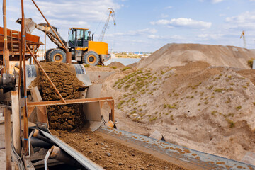 Sand quarry, Industrial plant with belt conveyor in open pit mining. Construction site, Industry...