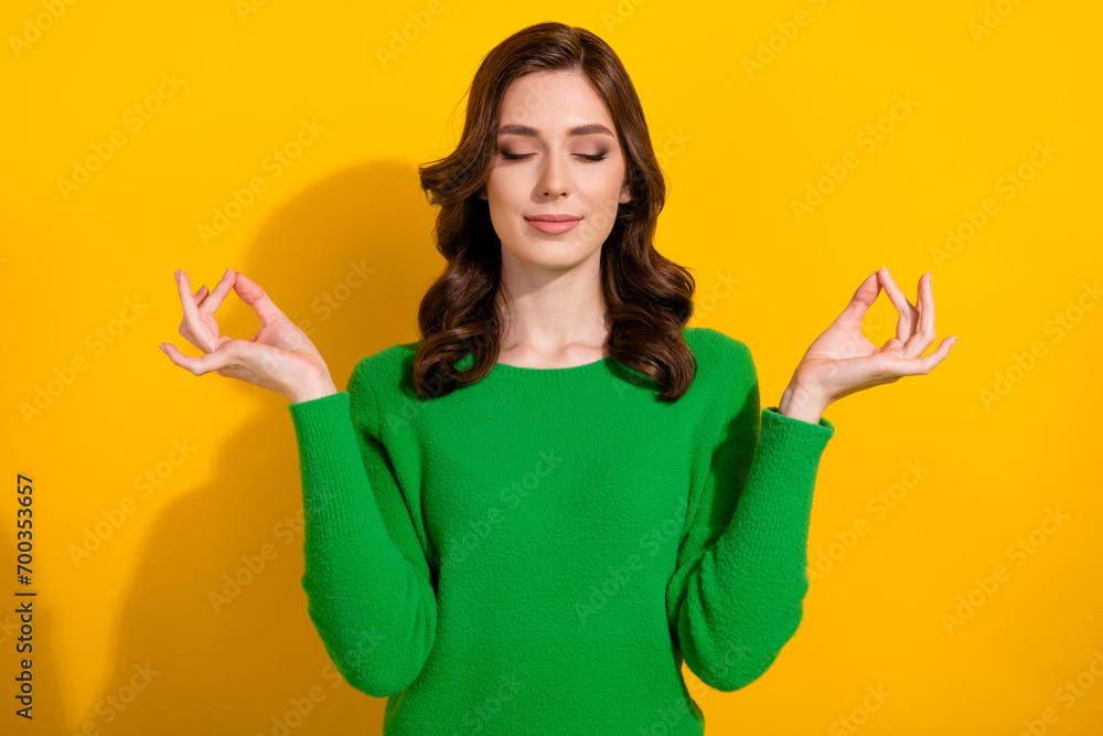 Wall mural Photo of charming young cute woman tired closed eyes relaxation process meditation retreat therapy isolated on yellow color background