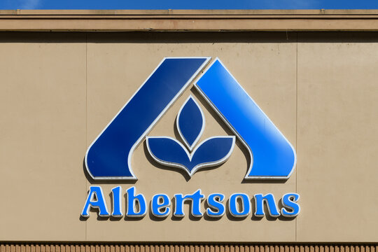Redmond, WA, USA - February 15, 2023; Blue sign of logo for Albertsons grocery store in sunshine
