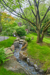 Beautiful Japanese garden with small stream.