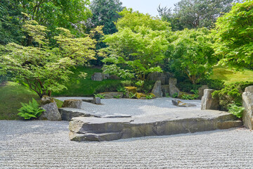 Beautiful japanese garden with gravel lines.