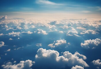 Fototapeta na wymiar Blue sky background with clouds View from plane