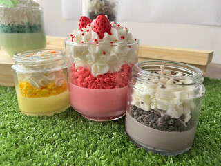 Decorative candles. Scented candles. Themed candles. Burning candle in the dark. Lemon candle.