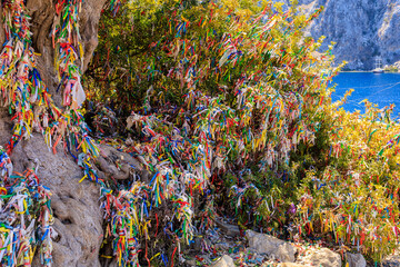 Colored ribbons for good luck, popular customs and superstitions. Background with selective focus and copy space