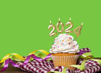 Cupcake With Candles Forming Number 2024 for Happy New Year - New Year Celebration