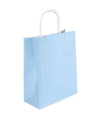 One light blue paper shopping bag on white background