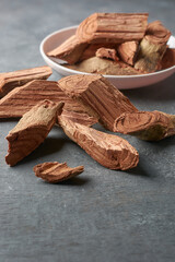 pieces of kothala himbutu bark wood, herb used widely in the ayurvedic medicine to treat diabetes...