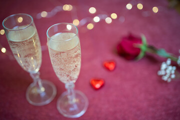 valentines day glasses of champagne close up and lights