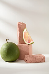 Pedestal for cosmetic product and packaging mockups presentation with natural ingredient - pink...