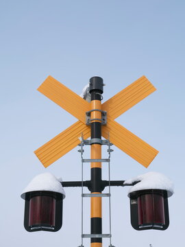 Hokkaido, Japan - December 23, 2023: Level crossing signal in Hokkaido, Japan