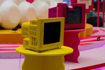 Retro yellow and pink old TV. colorful tube monitor.