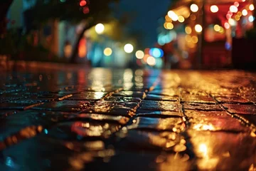 Foto op Aluminium A picture of a wet sidewalk with lights in the background. Perfect for showcasing urban nightlife or rainy city scenes © Fotograf