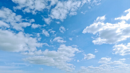 Obraz premium cute large white clouds in the blue sky bg - photo of nature
