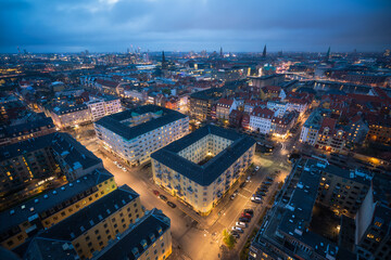 Aerial evening view of Copenhagen buildings and lights
