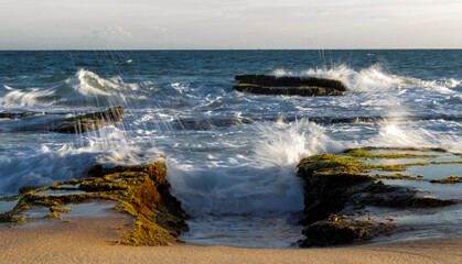 waves crashing on the beach