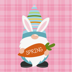 Easter gnomes with bunny rabbit ears holding a carrot.