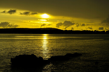 Fototapeta premium Tramonto con nuvole e luce drammatica,Medolino. Istria. Croazia
