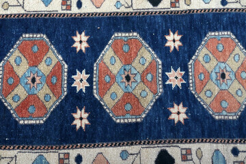Textures and patterns in color from woven carpets