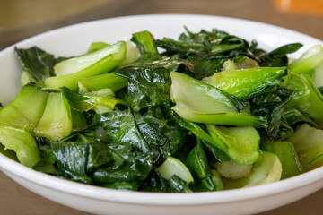 Stir fried green vegetable in a plate