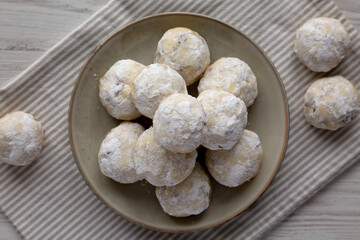 Homemade Snowball Cookies on a Plate, top view. Flat lay, overhead, from above.
