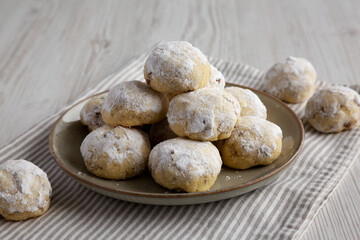 Homemade Snowball Cookies on a Plate, side view.