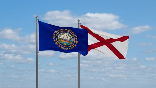Alabama and New Hampshire US state flags waving together on cloudy sky, endless seamless loop