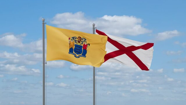 Alabama and New Jersey US state flags waving together on cloudy sky, endless seamless loop