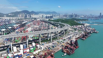 Kwai Tsing Container Terminals near Stonecutters Bridge, the main Far East Asia-Pacific trade shipment logistic port facility along between Kwai Chung and Tsing Yi, Hong Kong, China, Asia, Drone