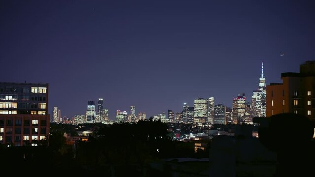 NYC Dusk to Night Skyline Time-Lapse: Illuminated Manhattan Cityscape from Elevated Urban Viewpoint