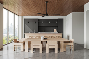 Modern home kitchen interior with bar island and cabinet, panoramic window