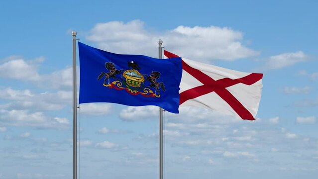 Alabama and Pennsylvania US state flags waving together on cloudy sky, endless seamless loop