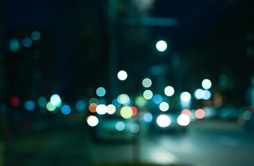 evening city street lights defocused background	
